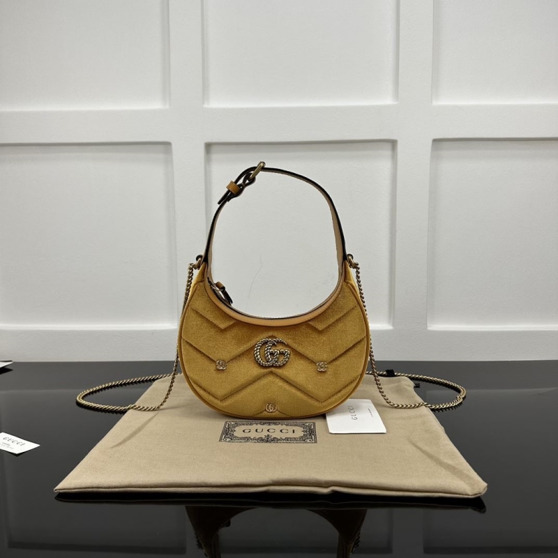 G*u*i top handle bags
